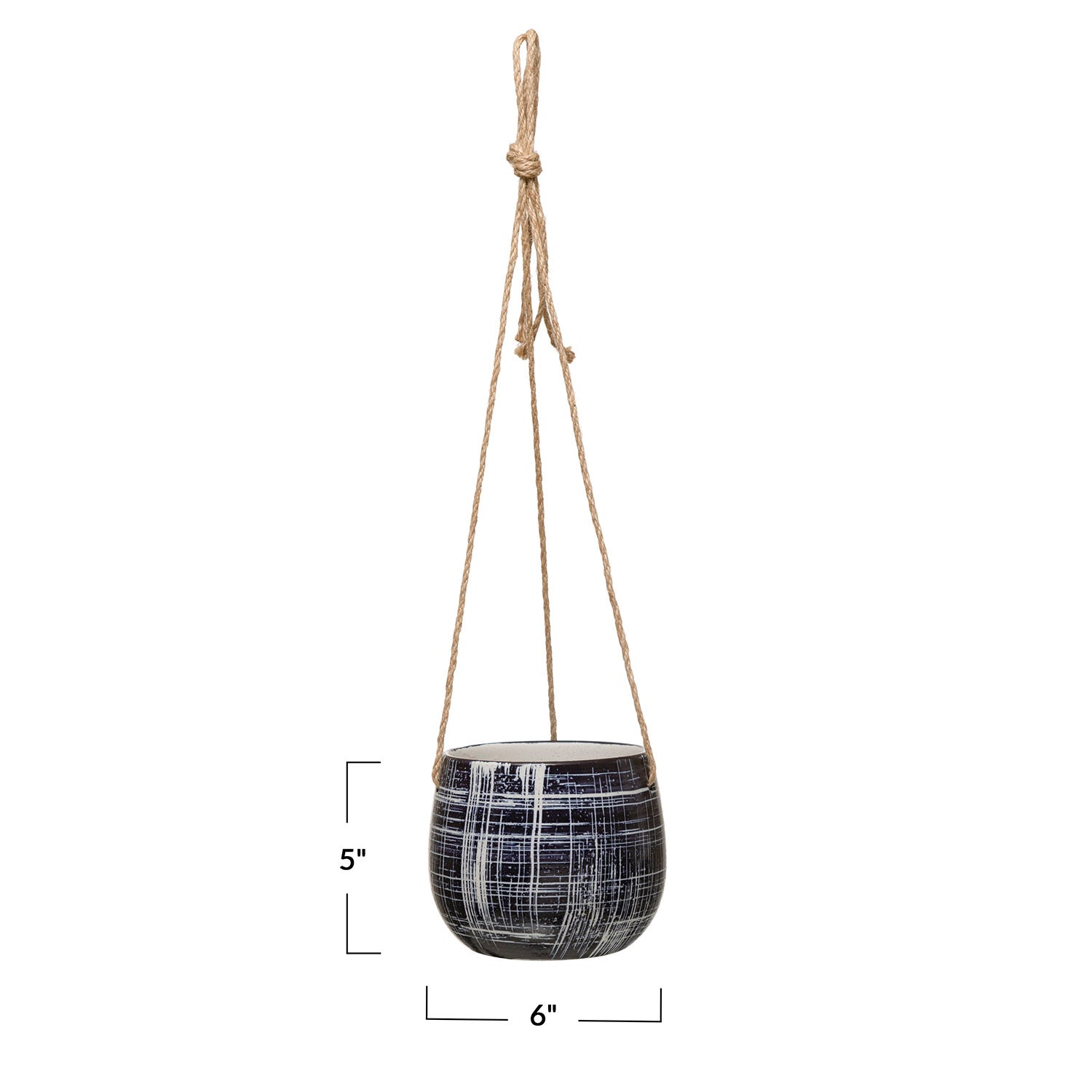 A dark blue stoneware hanging planter with white hatching patterns and a natural jute hanger.